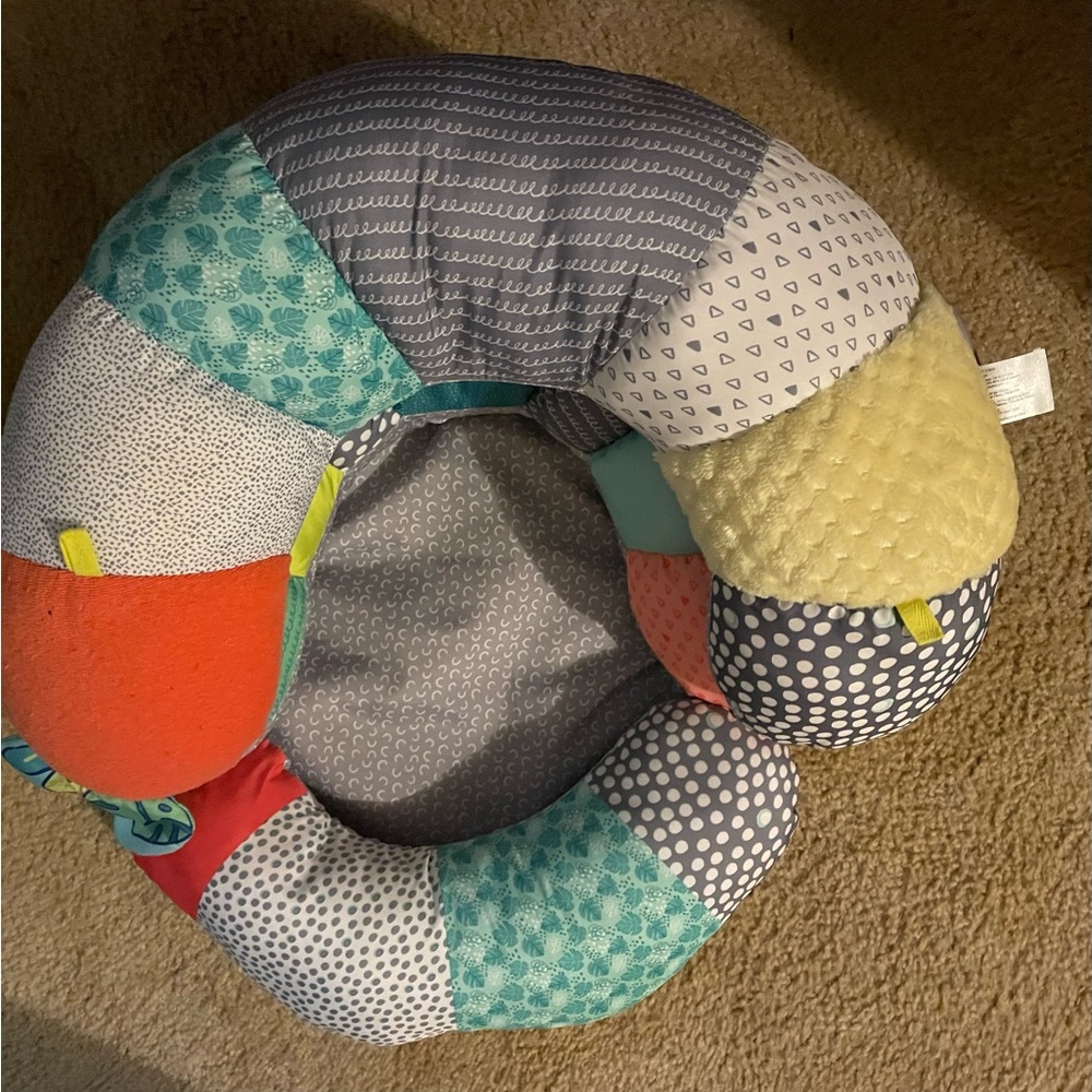 Baby sit me up pillow.  Great for learning to sit or rest